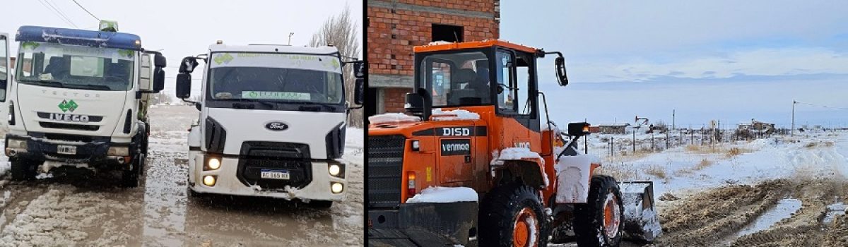 maquinas y camion trabajando nieve laguna