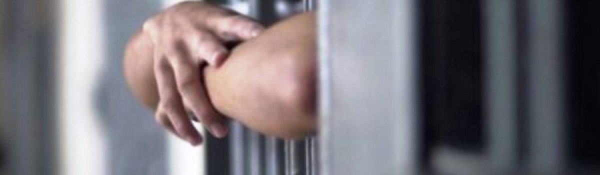 preso detenido rejas
